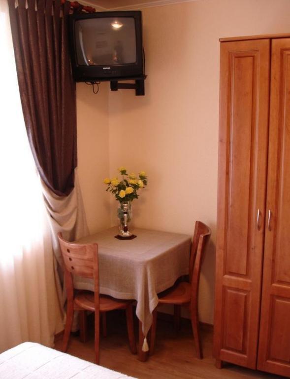 Sinay Hotel Poltava Chambre photo